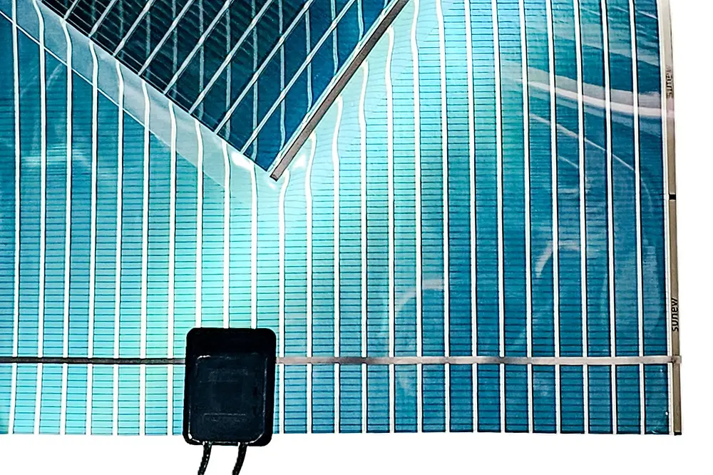 
Brilliant Matters produces advanced, eco-friendly organic semiconductor materials used to manufacture lightweight, flexible, and semi-transparent Organic Photovoltaic (OPV) panels. Unlike conventional silicon-based photovoltaic technology, OPV panels are produced using advanced material inks that can be printed through roll-to-roll manufacturing processes, similar to newspaper printing. (Image: Brilliant Matters)